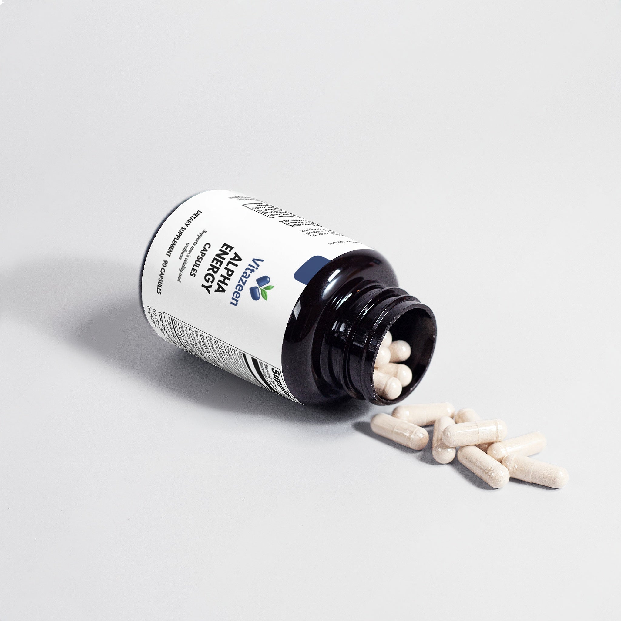 Vitamin supplement bottle with pills spilling out on a light gray background